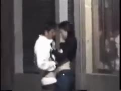 The lustful pair getting cuddly and wild right on the street